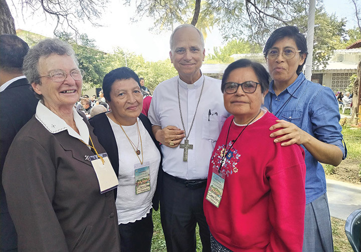 image of Cardinal Prevost with women religious in Peru