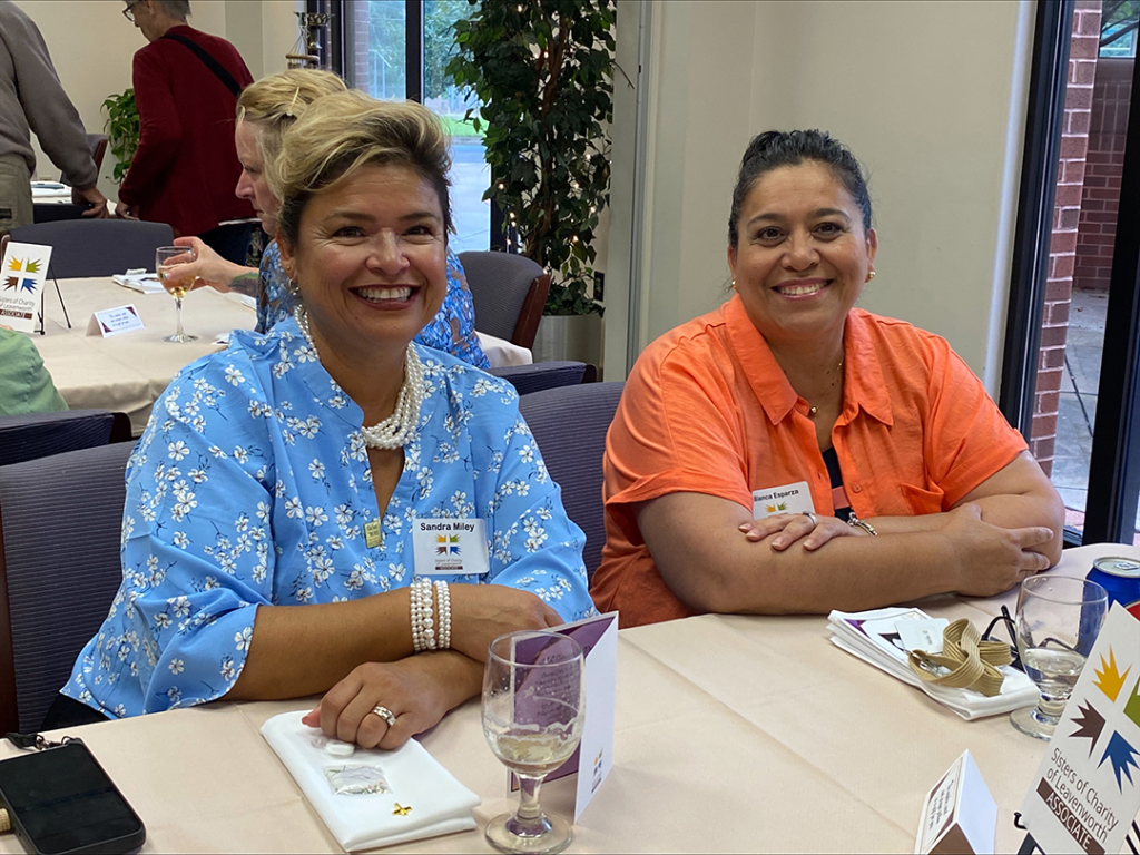 image of two smiling women
